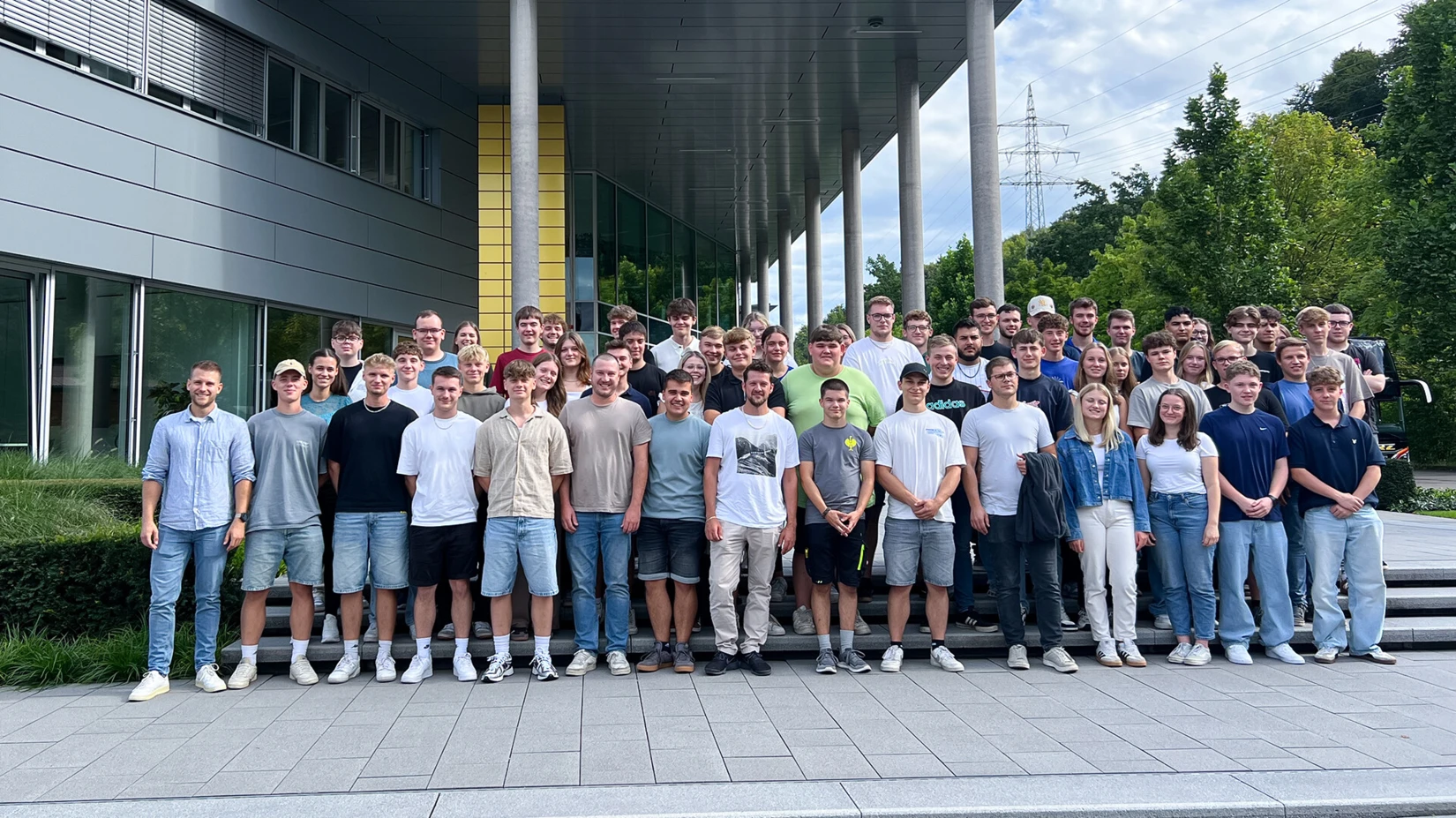 NETZSCH Pumps & Systems trainees pose together outdoors, showcasing team spirit and camaraderie during their excursion.
