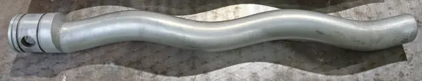 Tubo metálico ondulado de recambio original NETZSCH para bombas industriales, diseño preciso y resistente.